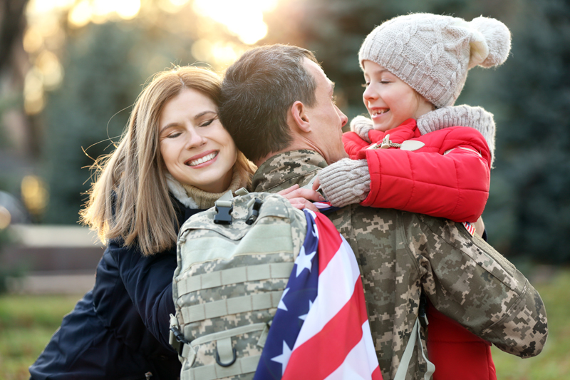 Military family hugging